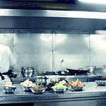 commercial kitchen with stainless steel kitchen equipment